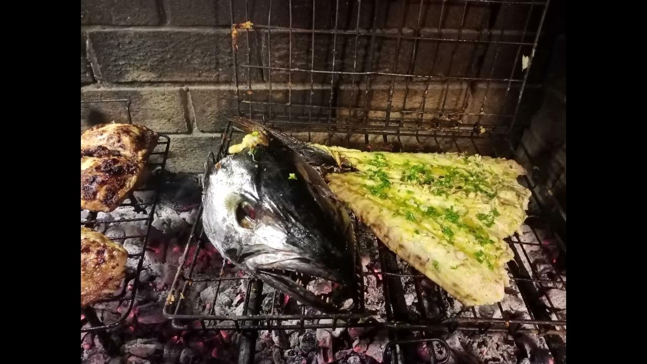Snoek on the Braai/BBQ, with garlic and parsley butter and a little bit of lemon juice