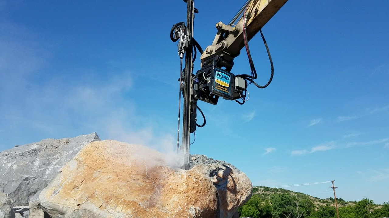 Oversized drilling in rock quarry YouTube