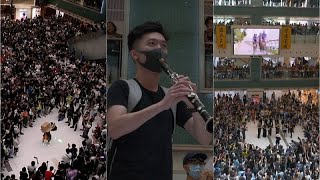 Thousands of Hong Kong citizens sing 