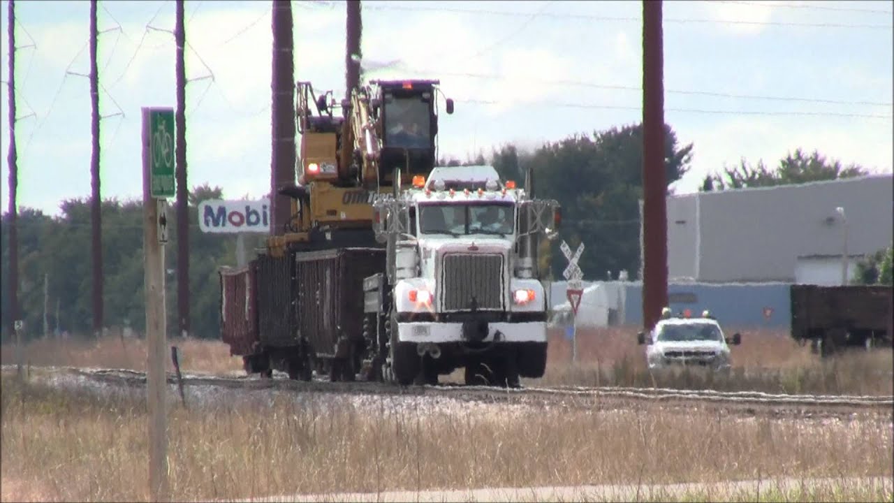 Hi-Rail Truck Unloading Track Materials - YouTube
