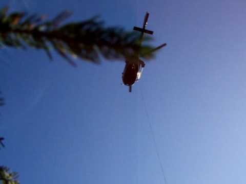 chopper lifts argo out of northern Alberta bush...