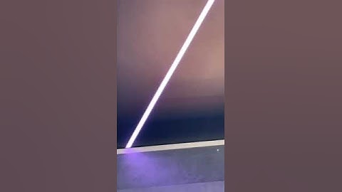 Black matt stretch ceiling with RGBW linear light lines