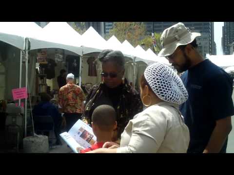 Gail Mitchell meets a family at 2009 Philadelphia Free Library Festival, 1