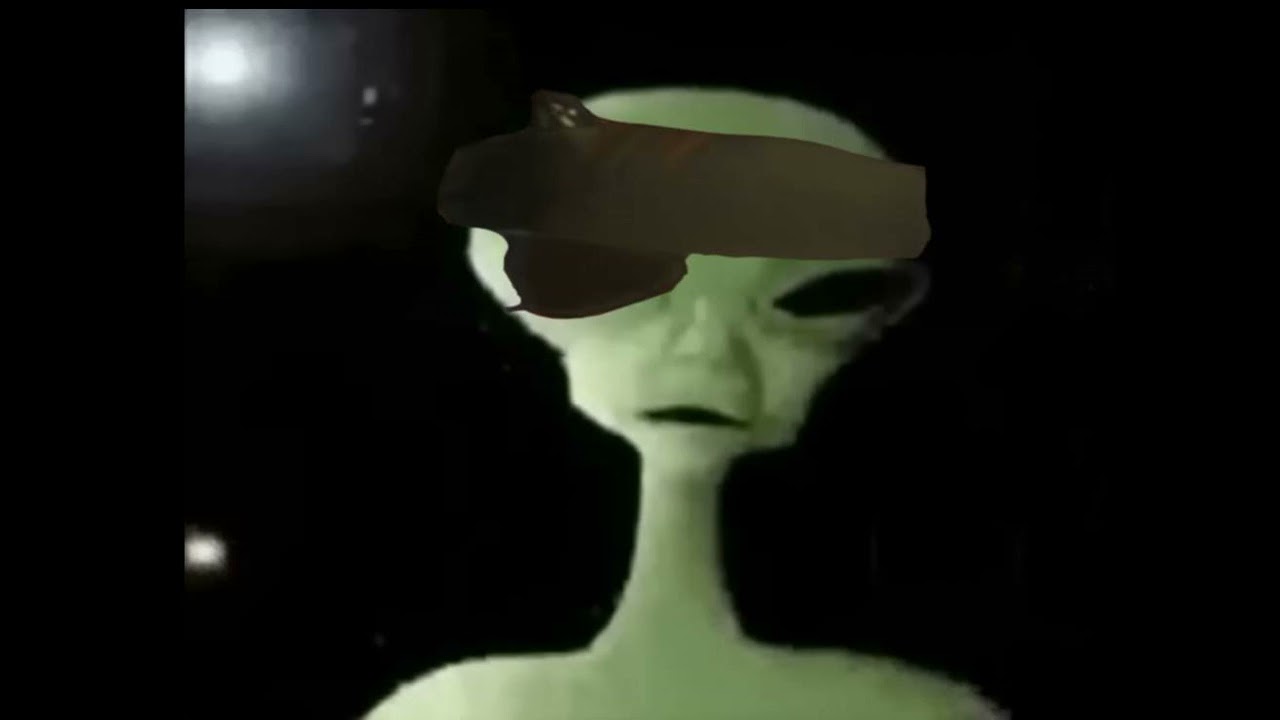 Green Alien Singing Invisible