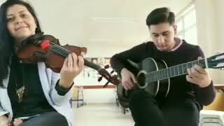 Cengiz Kurtoğlu kül gitar ve keman Resimi