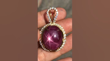 Mặt dây chuyền Ruby sao tự nhiên lên vàng 18k kết tấm xoàn xung quanh