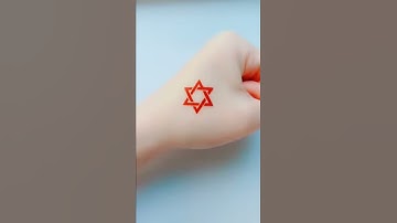 Six-pointed star tattoo