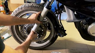 Замена передних тормозов Honda Deauville NT700V | How to change front brake pads and disks