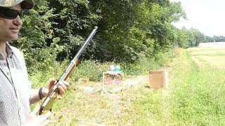 Splitting a 22 bullet on an axe blade trick shot!