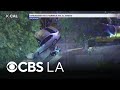 Allegedly armed suspect surrenders to LAPD officers after pursuit in El Sereno