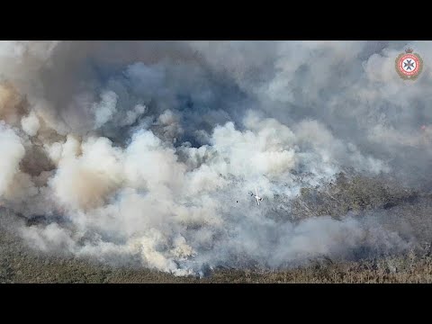 'Herculean' efforts save homes as Australia fires rage | AFP