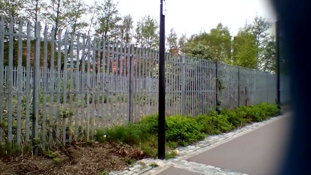 Class 201 & DD train Translink Enterprise 208 & 9003 arriving at Belfast Lanyon Place.