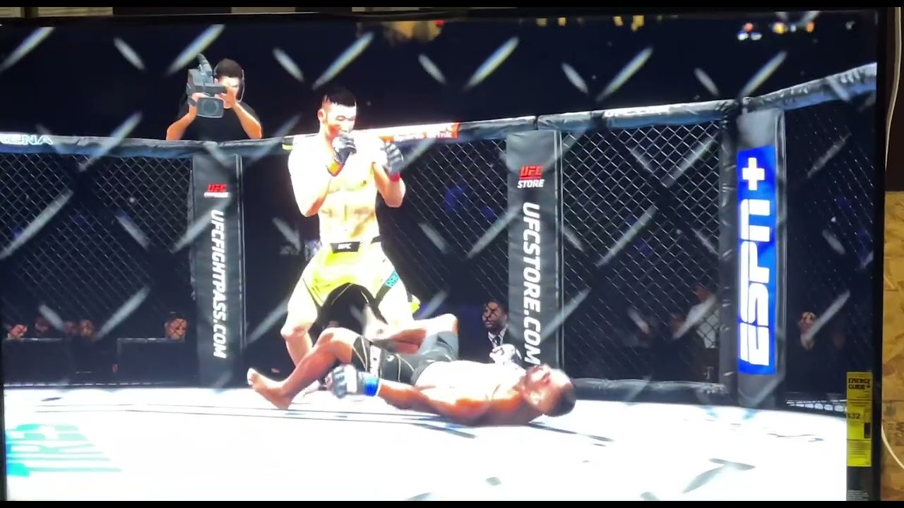 Rakhmanov knocks out Edwards with a flyingknee 