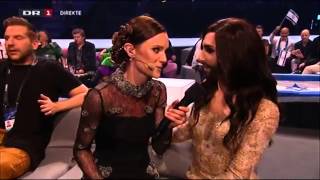 Eurovision host Lise RГёnne surprises Conchita Wurst in the Greenroom