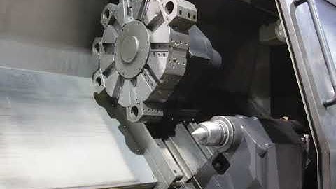 Programmable tailstock body operation via MDI command