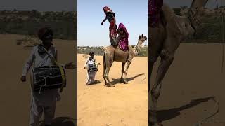 camel strong woman standing with dhol dance program #viralvideo #desertlife