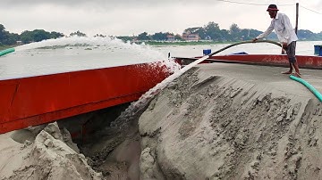 Incredible Power of Water: Unloading River Sand with a High-Pressure Pump