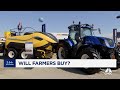 World ag expo debuts new tractors ahead of deere and cnh earnings