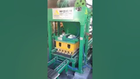 QTJ4 25 semi-automatic block making machine video. solid block with logo.