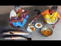 Cooking  eating big size shol fish curry by tribe grandmothers in their santali tribal process