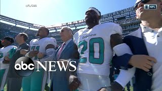 NFL owners lock arms with players during national anthem