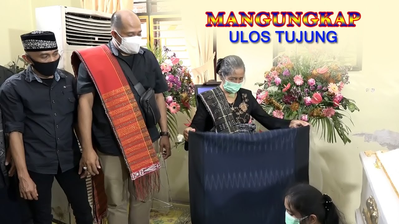 Mangungkap Ulos Tujung