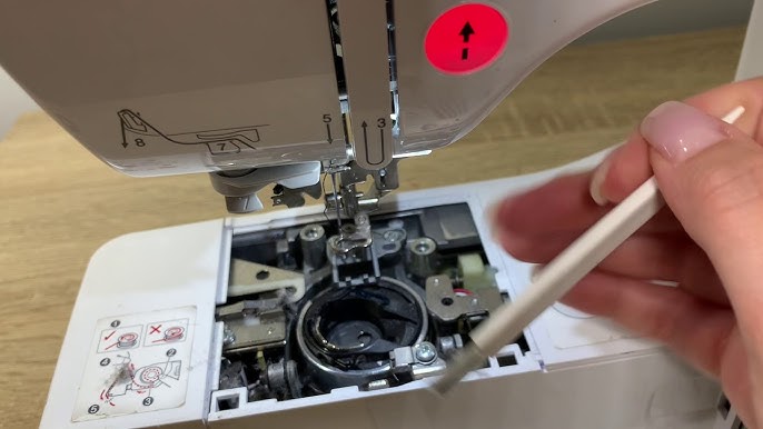 Brother sewing machine lint removal feed dogs bobbin cavity