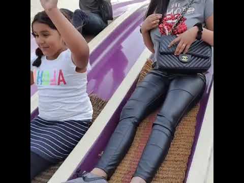 Rezina Laigsingh familie Hellendoorn glijbaan mat lachen snel spelen kinderen