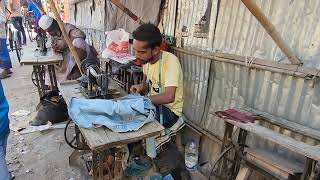 Tailors Use Sewing Machines With Foot Pedal In The Streets Of Dhaka