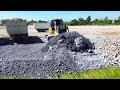 Unbelievable Power! SHANTUI DH17C3 Dozer Moving Rocks into Water for Landfill