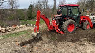 Excavating With The Kioti To Add A Fire Pit - Hauling Boulders, Dirt and Bringing In Stone