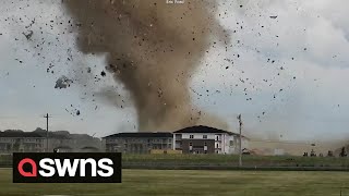 Huge tornado rips through suburban areas in Indiana sending debris into the air | SWNS
