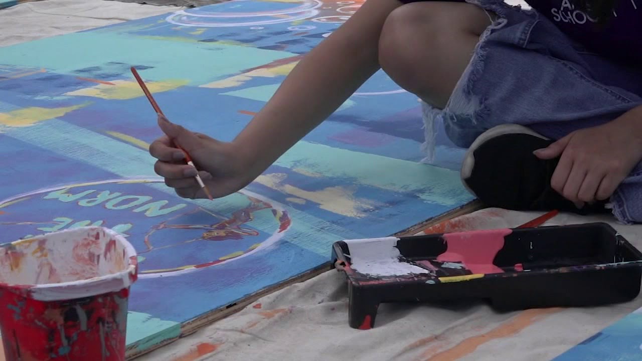 Artist transforms plywood from Chicago looting into murals about unity, community