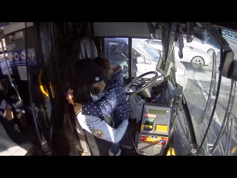 Bus Driver Comforts Crying Child After Mother Has Seizure on the Street
