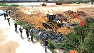 Next Level Best operator bulldozer pushing dirt land Filling Up dump truck dumping dirt into the mud