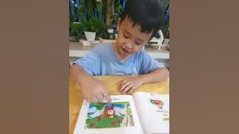 Tiếng Anh Giao Tiếp Thiếu Nhi Tại Phan Thiết: Shin reading a book called Greedy Monkey