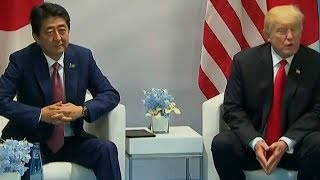 Trump isolated at G-20 on climate and trade, returns to mixed reviews
