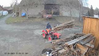 Small Tractor Orvex Equus Unloads Wood, Customs Loader