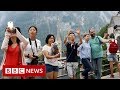 A town of 800 people that gets 1m tourists a year - BBC News