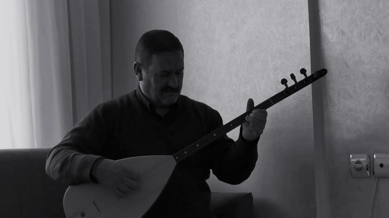 NADİR KESKİN  ( BAHÇEMİZDE BİR GÜL OLSAN)