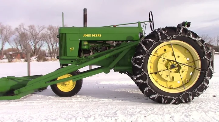1954 Model 70 John  Deere gasoline tractor with snow plow.