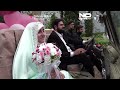 زفاف جماعي في طهران يحول العربات العسكرية إلى سيارات عرائس
