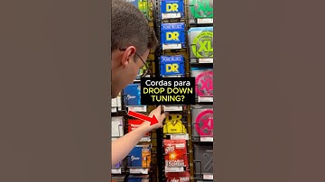 DESCOBRINDO cordas para DROP DOWN TUNING na Guitar Center de Orlando (DR DDT STRINGS)