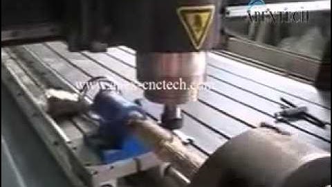 USA apextech cnc router on processing the cylinderical wood material made in china