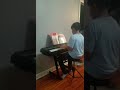 Kaleb playing piano "Prayer of the Lowly One"