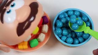 Feeding Mr  Play Doh Head Rainbow Gumballs from Dubble Bubble Candy Dispenser!