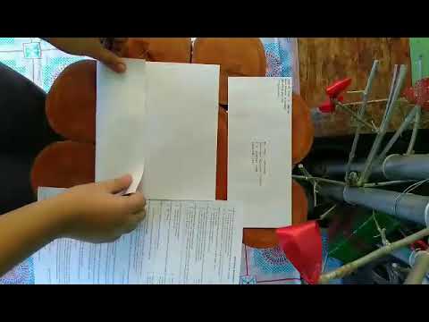 How to properly fold a Short & Long bondpaper in a Long envelope?