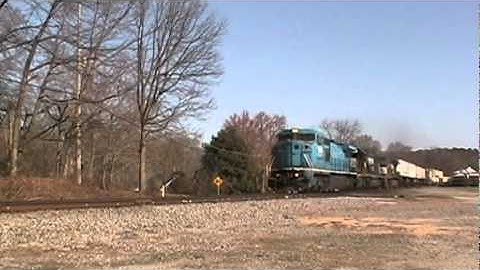 NS 203 with a LMS C40-8W leader highballing through Norcross