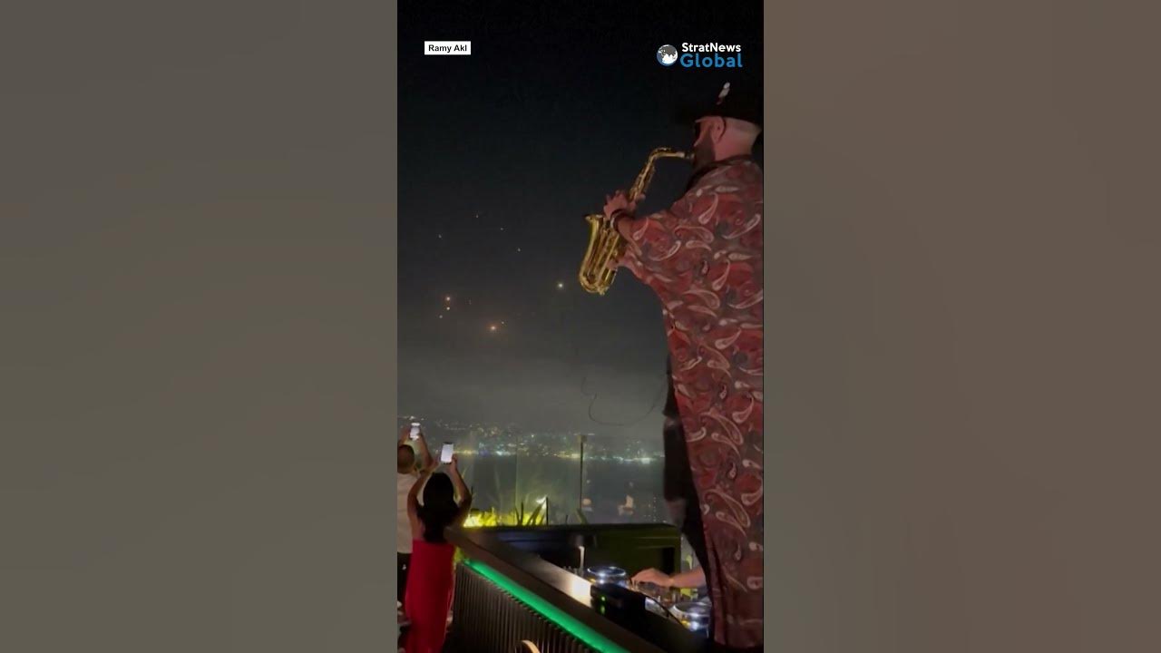 #Lebanese saxophonist plays on as #Iranian missiles charge towards #Israel | #shorts