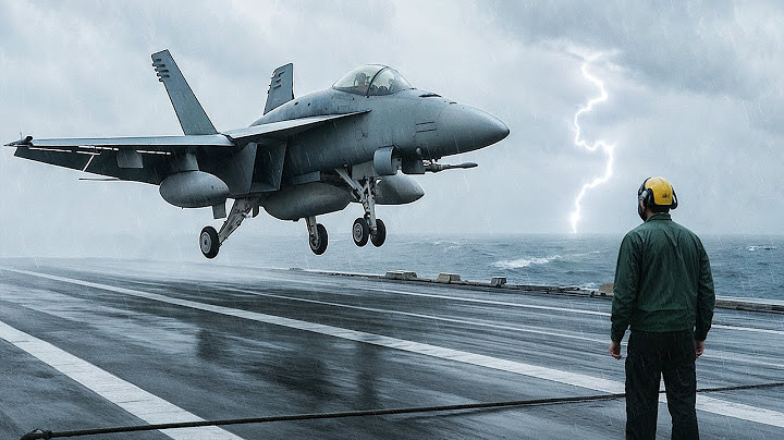 How do JETS land on a CARRIER in a STORM?